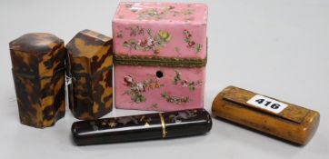 Two tortoiseshell etuis, a tortoiseshell case, a 19th century walnut snuff box and and enamel