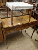 A walnut writing table and a stool, W.105cm, stool W.56cm