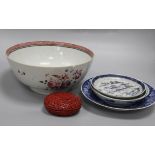 A Qianlong famille rose bowl and three blue and white plates