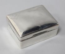 A George V silver cigarette case by William Comyns, 11.5cm.