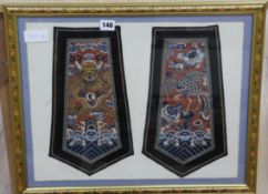 Two Chinese embroidered silk panels of a dragon and a phoenix, framed, height 39cm width 49.5cm