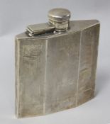 A 1930's Art Deco engine turned silver hip flask, 10.3cm.