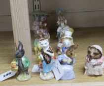 A Beswick Beatrix Potter figure, Susan and eleven other BP-3 figures, including The Old Woman Who