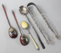 Two Russian enamelled spoons, A Scandinavian silver and enamel spoon, one other silver spoon and a