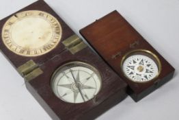 Two late Georgian mahogany cased compasses