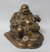 A bronze figure of Budai