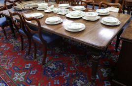 An Edwardian extending dining table extends to 240cm.