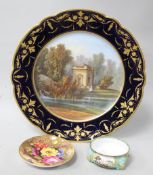 A Sevres cabinet plate, painted with a view titled to underside 'Pavillon de Musique à Trianon',