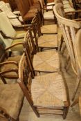 Four rush seat stick back dining chairs