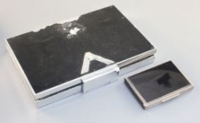 Two Art Deco paste, enamel, silver and metal compacts, probably French, c.1940, rectangular, the