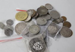 A collection of coins including Indian provincial minted coinage, silver dollar, etc.