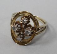 A 14ct gold and rose cut diamond set oval openwork dress ring, size R.