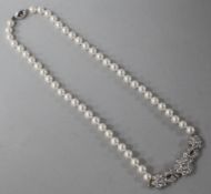 A modern 18ct white gold, cultured pearl and diamond set choker necklace, with a total diamond