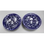 A pair of Chinese slip-decorated blue ground stem bowls, diameter 23cm