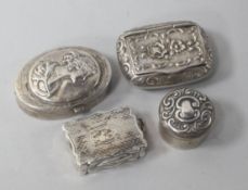 A Victorian silver vinaigrette and three assorted silver pill boxes.