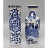 A Chinese 19th century blue and white cylindrical vase and a similar baluster vase, variously