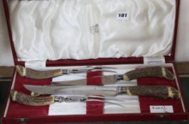 A plated Harrods bone carving set, in red morocco presentation case