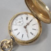 An engine turned 14ct gold hunter fob watch, with Roman dial and subsidiary seconds.