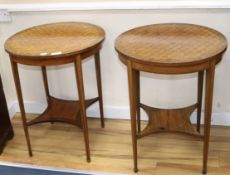 A pair of Edwardian parquetry topped occasional tables W.60cm