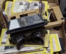 A stereoscope viewer and and cards