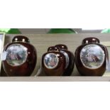 Four Carlton Ware Rouge Royale ginger jars and covers decorated with Fragonard-style scenes of