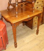 An Edwardian golden oak table and a smoker's bow, W.92cm