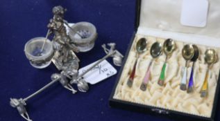 A cased set of six silver gilt and coloured enamel coffee spoons, a pair plated 'Greyhound' knife