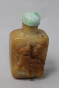 A Chinese crave hardstone snuff bottle and stopper