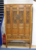 A chinese yellow wood cabinet, 19th century W.117cm