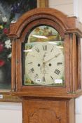 An early 19th century eight day oak longcase clock H.207cm