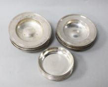 A set of seven modern silver dishes and another set of eight smaller silver dishes 15.3 oz.