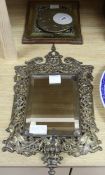 A brass girandole mirror, a brass plaque and a picture frame, mirror 50 x 29cm
