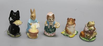 A Beswick Beatrix Potter figure, Duchess with Pie, BP3b and four other figures with gold oval