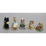 A Beswick Beatrix Potter figure, Duchess with Pie, BP3b and four other figures with gold oval