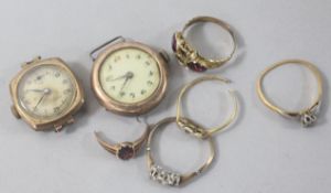 Two 9ct gold watch heads and five various gold and gem set rings (all a.f.).