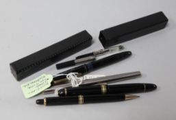 Three Montblanc fountain pens and a pencil