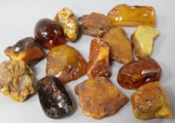 Thirteen assorted pieces of raw amber.