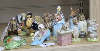 Twelve Beswick Beatrix Potter figures, mainly BP-3c and a Studio Royal Doulton figure of Johnny