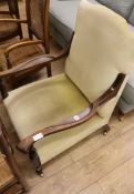 An Edwardian mahogany framed club armchair