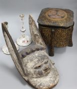 A pair of enamel floral candlesticks, A tribal carved mask and a lacquer box, candlesticks height