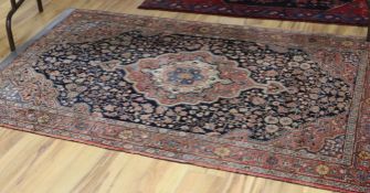 A Bokhara red ground rug and another 210 x 132cm
