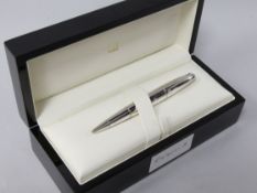 A Dunhill boxed silver ballpoint pen
