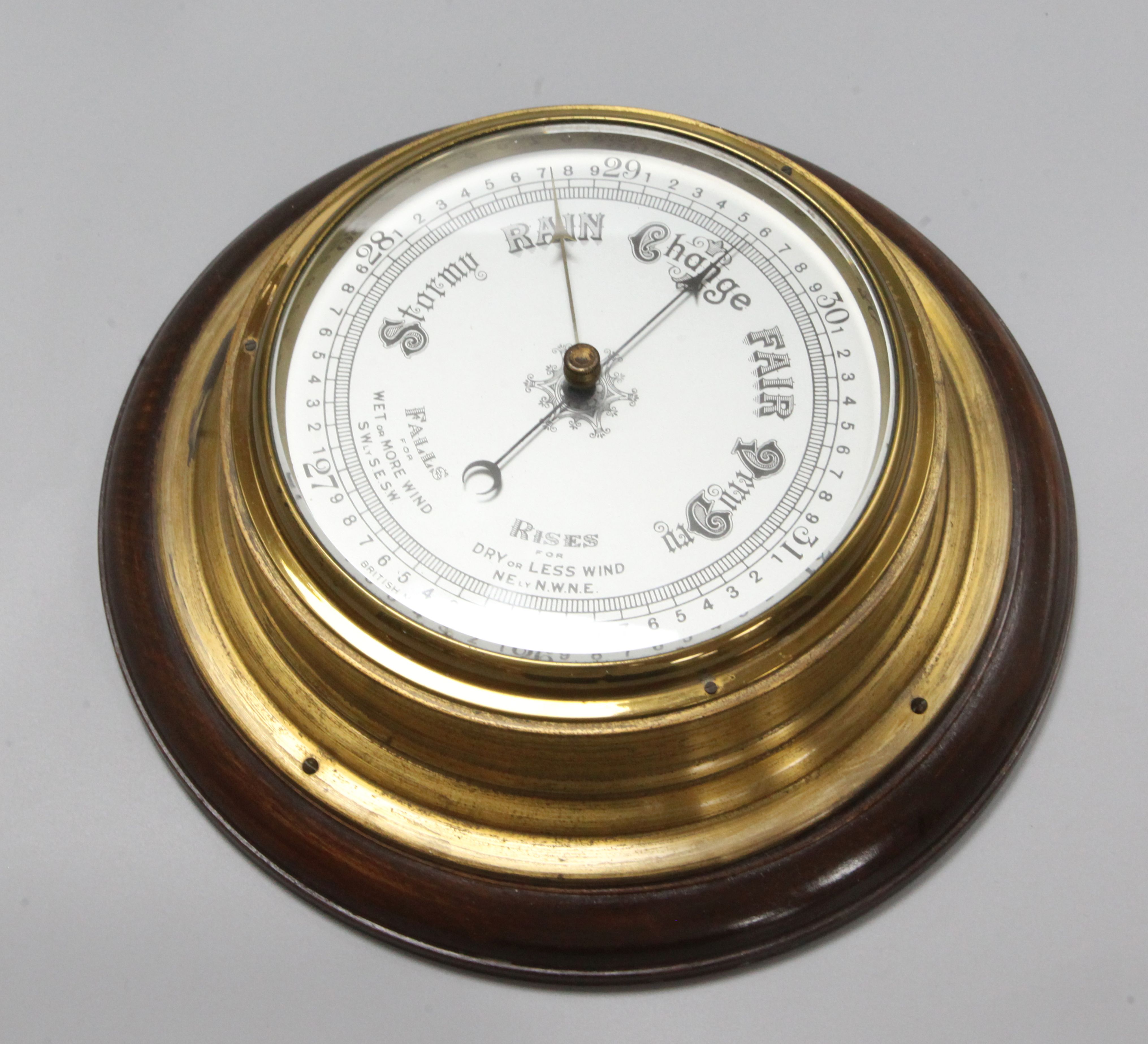 A ship's barometer, diameter 26cm
