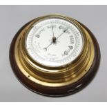 A ship's barometer, diameter 26cm