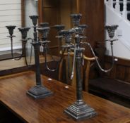 A pair of plated five light four branch candelabra, height 69cm