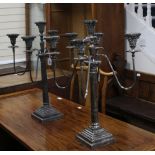 A pair of plated five light four branch candelabra, height 69cm