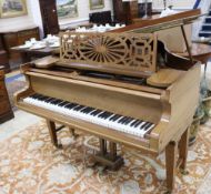 A Chappell faded rosewood cased baby grand piano W.142cm