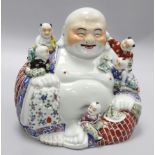 A Chinese ceramic Buddha, height 26cm, width 26cm