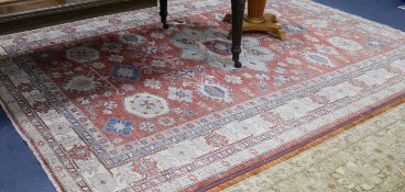 A small Oriental carpet 350cm x 260cm