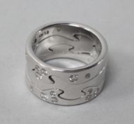 A modern Georg Jensen 18ct white gold and diamond set fusion ring, with Georg Jensen box, size L/M